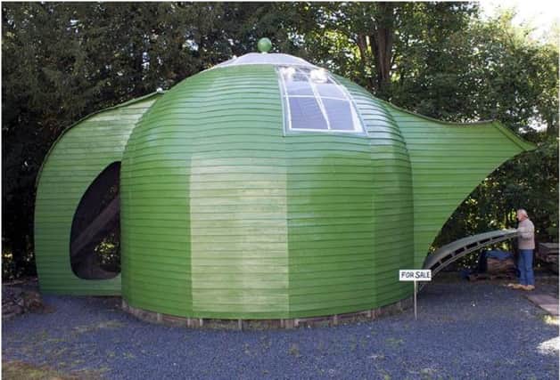 A Scots sculptor, Ian Hunter, from Melrose, is putting his teapot house on the market for £10,000. Sellers Rettie - who often market mansions and castles - describe the home as a "unique multifunctional two-storey space".