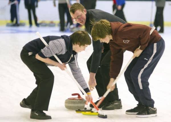 Curling youth league compete against each other at Kelso Ice Rink, 28th Jan 2014.