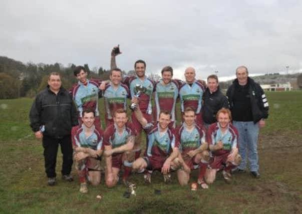 A happy St Boswells  lifted the Hawick Linden sevens trophy last weekend