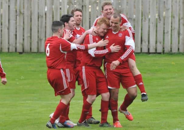 A delighted Peebles Rovers celebrate their win