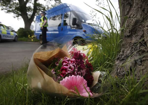 Floral tributes near the scene. Picture: Danny Lawson/PA