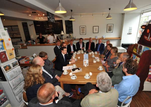Chancellor George Osborne and MSP John Lamont met with local business owners at Mainstreet Trading Company in St Boswells on Friday morning.