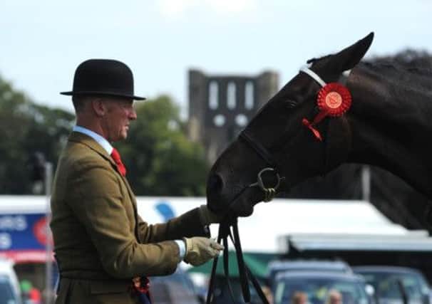 Richard Telford with the overall hunter champion