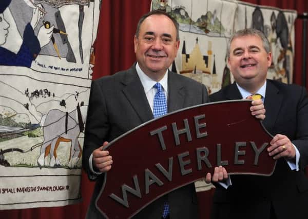 First Minister Alex Salmond and Scottish Borders Councillor David Parker at Eildon Mill this morning during an announcement that trains will be operational on the Borders Railway from September 6, 2015 and that the Great Tapestry would have a permanent home at Tweedbank Station.