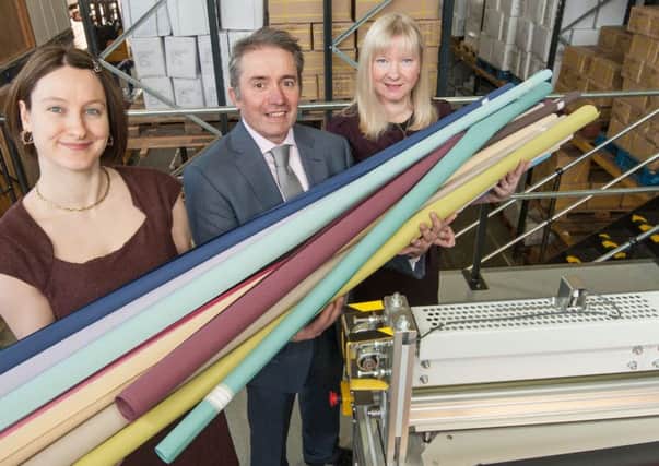 Chris Mather's company makes interior and exterior blinds. 
Chris Mather, wife Caroline and daughter Kayleigh at Dash Components in Selkirk