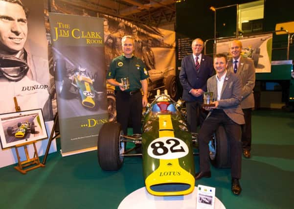 Clive Chapman, Ian Calder, Doug Niven, Allan McNish with historic trophies from 1965 and The Lotus Type 38 winner of The Indianapolis 500. Picture: Malcolm Griffiths