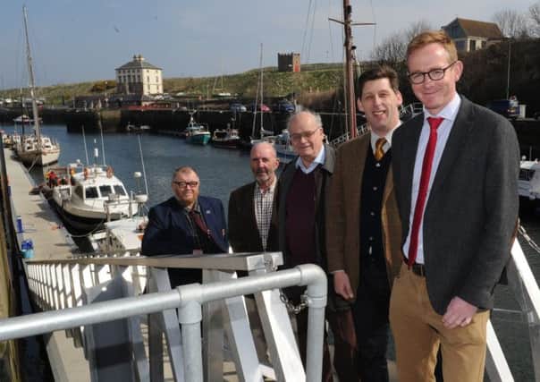 David Shield, Sandy Ritchie, Jim Evans, Ian Duncan MEP and Conservative general election candidate John Lamont at Eyemouth harbour. Picture: Kimberley Powell