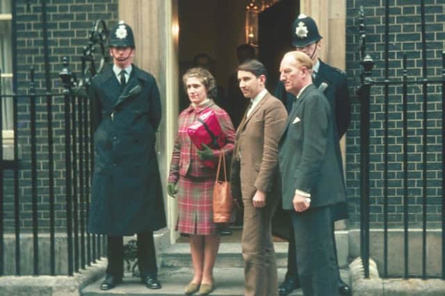 Borders Railway campaigner Madge Elliot delivers a petition to No 10 Downing Street in December 1968 with her 11-year-old son, Kim,  David Steel MP, the Earl of Dalkeith and bagpiper Harry Brown