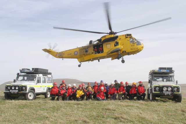 Borders Search and Rescue Unit with a Sea-king helicopter from RAf Boulmer