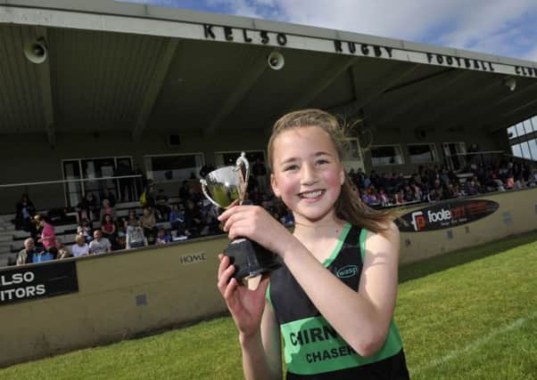 Kelso Games 2015. Isla Taylor of Chirnside wins the youths mile event at Poynder Park.