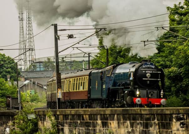 Photograph by Ian Georgeson
Tornado steam train travells along the East Coast Main line and arrives at Edinburgh Waverley station.