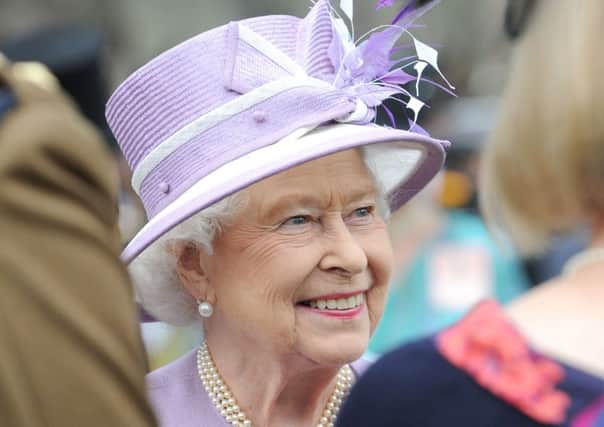 Pic Lisa Ferguson 01/07/2015
Royal Garden Party at the Palace of  Holyrood House, Edinburgh

Her Majesty the Queen and HRH the Duke of Edinburgh speak with guests