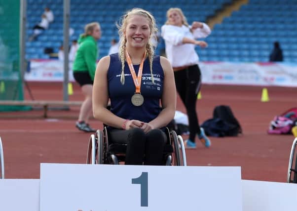 Samantha Kinghorn receives her gold medal at the Sainsbury's 2015 School Games.