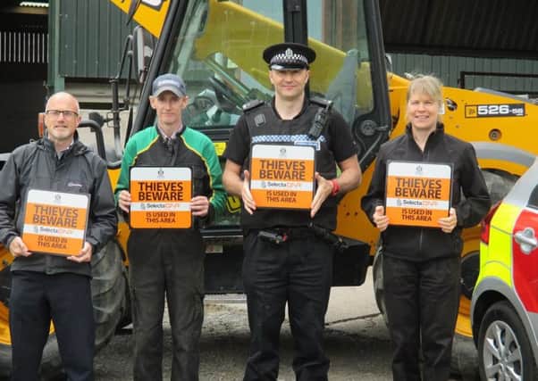 From Left to Right: PC Nick Walker - Crime Prevention Officer  Safer Communities, Police Scotland; Mr Gavin Millar  Timpendean Farm, Jedburgh  Local NFUS branch Chairman; PC Gary Chisholm  Community Beat Officer, Jedburgh and District; Samantha Seeds  Local Authority Liaison Officer  Scottish Fire and Rescue Service.
