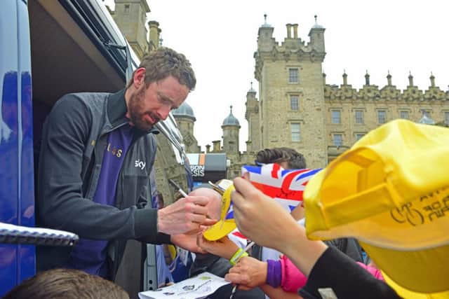 Photographer Ian Georgeson, 07921 567360
Tour of Britain 2015, Sir Bradley Wiggins signs autographs at the finish, Floors castle, Kelso