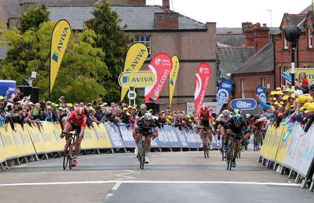 Team Sky's Elia Viviani (right), Etixx-Quick Step's Mark Cavendish and Lotto-Soudal's Andre Greipel (left) race towards the finish line during Stage 1 of the Tour of Britain.