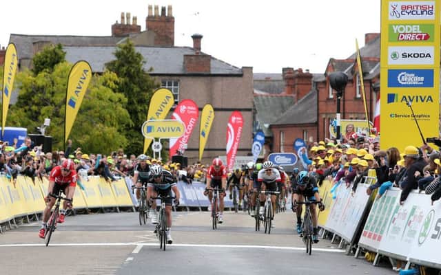Team Sky's Elia Viviani (right) wins the first stage ahead of Etixx-Quick Step's Mark Cavendish and Lotto-Soudal's Andre Greipel (left) during Stage 1 of the Tour of Britain. Picture: PA