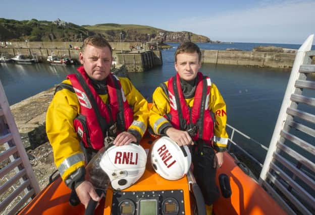 The St Abbs Lifeboat Station is to close today. Lifeboat crew members pictured here from left to right are Ian Wightman and Andrew Redden. Picture: Ian Rutherford/JP