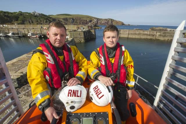 The St Abbs Lifeboat Station is to close today. Lifeboat crew members pictured here from left to right are Ian Wightman and Andrew Redden. Picture: Ian Rutherford/JP