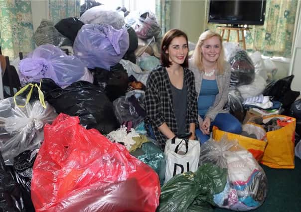 Vanessa Reith and Yasmin Sonkur surrounded by donations for refugees. Picture: Derick Thomson