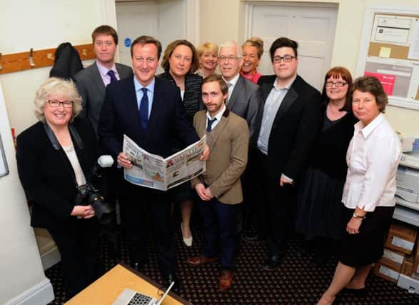 Prime Minister David Cameron is pictured here visiting another Johnston Press title, the Northumberland Gazette.