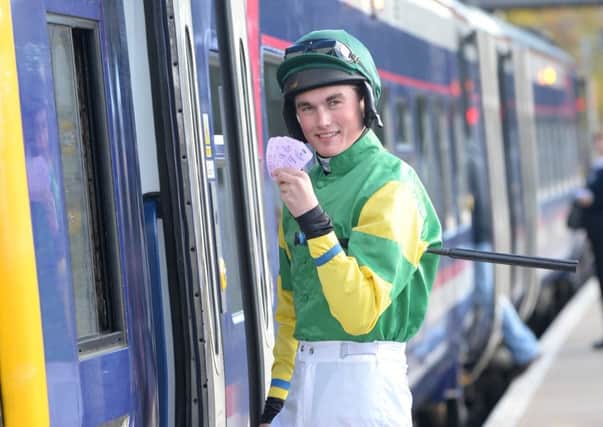 Jockey Callum Bewley catches the train at Craighall Station en route to Musselburgh.Musselburgh racecourse have announced a free bus shuttle service to take racegoers from Newcraighall to the racecourse on race days.