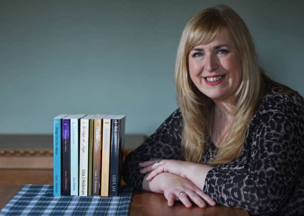 Author Lisa Hobman at home in Swinton with eight of the novels she has penned already. She will reach double figures this month. Picture: Stuart Cobley