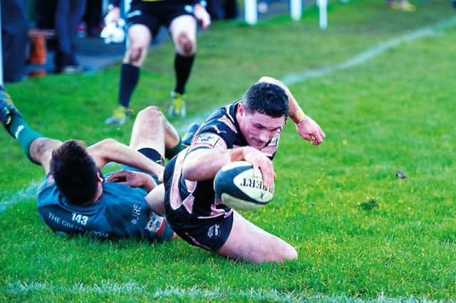 Ayr captain Ross Curle finishes off a superb break from Archie Russell by touching down in the corner. Photograph: John Devlin