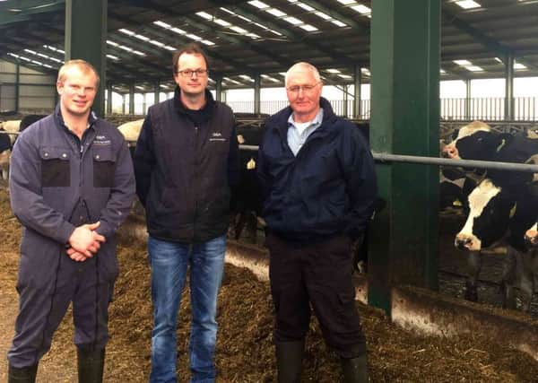 Sandy Mitchell (centre) with two key staff members Ewan Corbett and Dairy Manager Ian Fenwick at Kennetsideheads. AgriScot Scottish Dairy Farm of the Year
