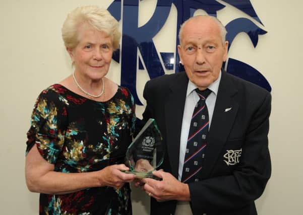 Jim and Mary Inglis with their Spirit of Rugby award
