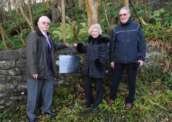 Family members with the plaque, including Bob Norwood (left) and David Geddes (right) who spoke at the service
Memorial plaque unveiling at Hutton Mill Bridge for Sergeant Piolt Robert Fredrick Noorwood and Sergeant Navigator Irvine Jackson who were killed in a crash in 1943.