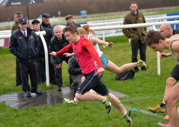 Cameron Tindle crossing the finishing line in the 146th running of the New Year Sprint at Musselburgh Racecourse