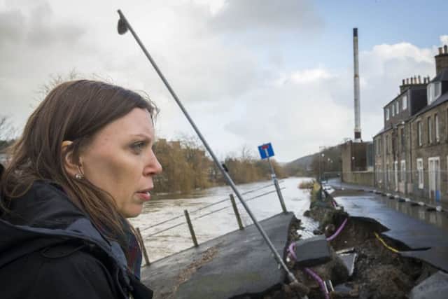Scottish environment minister Aileen McLeod surveys the damge. Picture: Danny Lawson/PA Wire