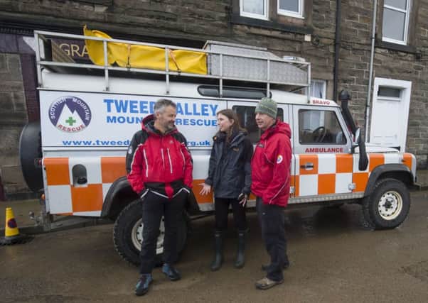 Scottish environment minister Aileen McLeod (centre) meets members of the Mountain Rescue service during her visit toHawick today. Picture: Danny Lawson/PA Wire