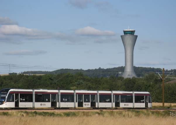 An Edinburgh tram passing the Airport control tower.