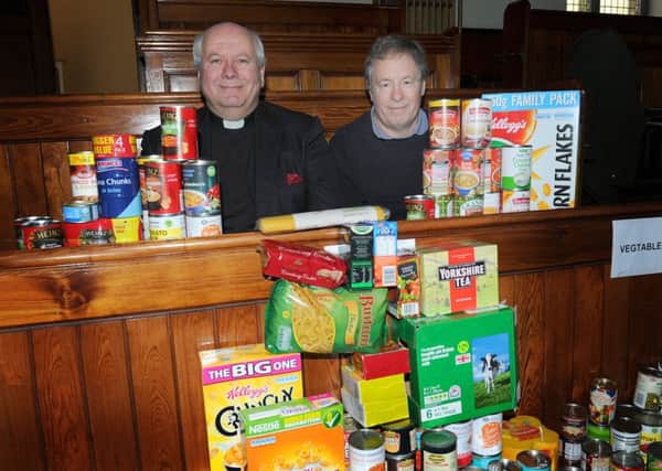 Minster Stephen Blakey and Charles Swan at Duns Food Bank