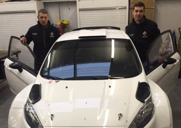 Garry Pearson (right) and his co-driver Robbie Mitchell with their new Fiesta R5.
