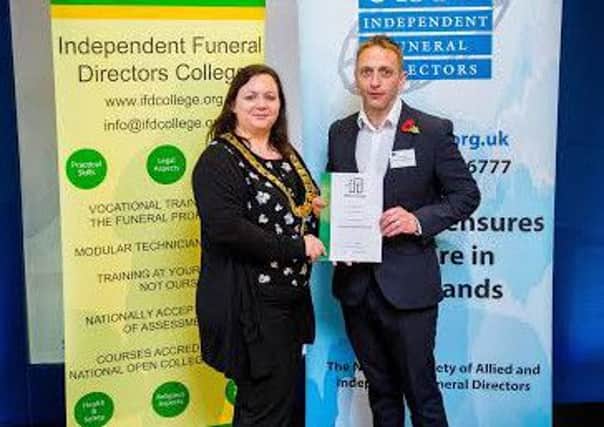 SBBN-21-01-16 Barry Gibson, from Kyle Brothers Funeral Directors receiving his certificate