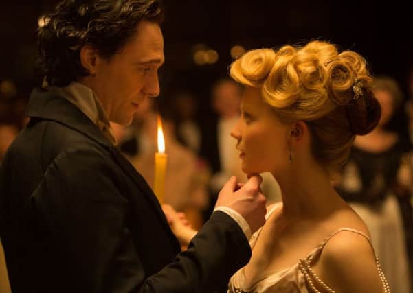 Undated Film Still Handout from Crimson Peak. Pictured: Tom Hiddleston as Sir Thomas Sharpe and Mia Wasikowska as Edith Cushing. Picture credit should read: PA Photo/Kerry Hayes/Universal. WARNING: This picture must only be used to accompany PA Feature FILM Hiddleston.