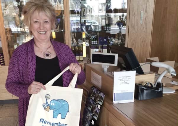 MIDLOTHIAN South, Tweeddale and Lauderdale MSP Christine Grahame has welcomed the introduction of a minimum 5p charge for carrier bags in shops throughout Scotland.