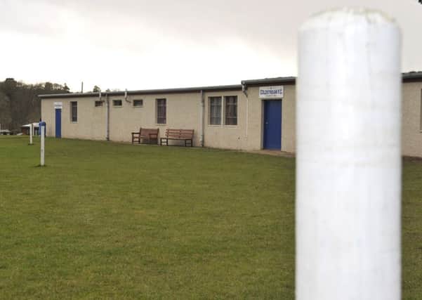 Fence posts around Coldstream FC's ground at Home Park.