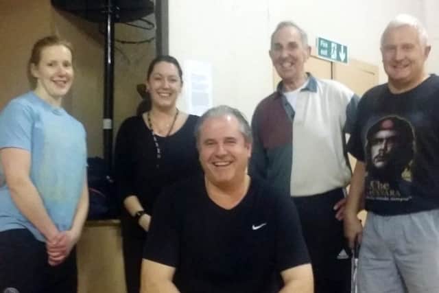 Hawick Badminton Club's Harry Turnbull (front) with, from left, Laura Douglas, Laura Turnbull, Bert Robertson and Scott Elliot.