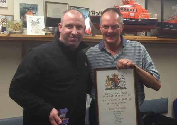 sbbn Eyemouth's Mark Johnston and Tom Gillie honoured by RNLI