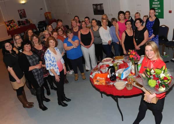 Slimming Wolrd Kelso celebrating their first birthday where the group have collectively lost 272 stone. Group leader Becky Scott at the front
