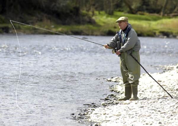 The River Tweed is currently enjoying its second-highest salmon catches since records began more than 50 years ago. The Tweed Commissioners and related Tweed Foundation carry out research into the river environment. Pictured is fisherman Brian Colin, from Morebattle, fishing on the River Tweed at Dryburgh. 
Picture by Jane Barlow 10/04/07