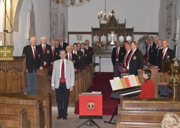 A contingent of Berwick Male Voice Choir preparing to sing at St Marys Church, Burgh-by-Sands
