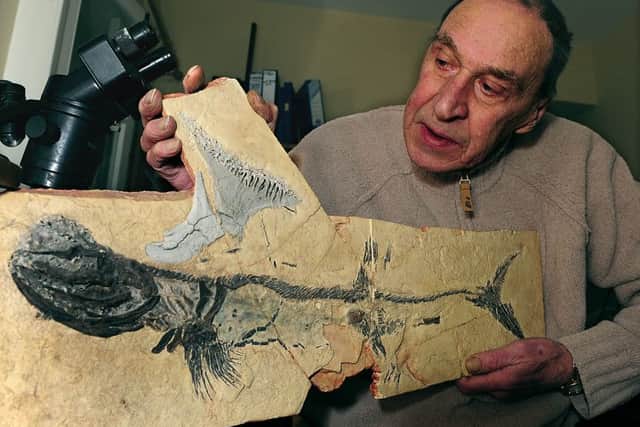 Selkirk Palaeontologist Stan Wood's Romer's Gap fossil find in the Whiteadder Water near Chirnside. Stan shows a fossil of a shark found at Bearsden dating 325 million years ago.