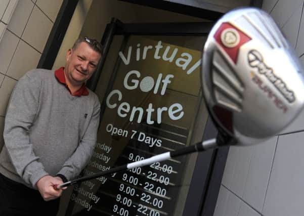Tom Gilhooley with Galashiels' first 'Virtual Golf Centre' in Channel Street.