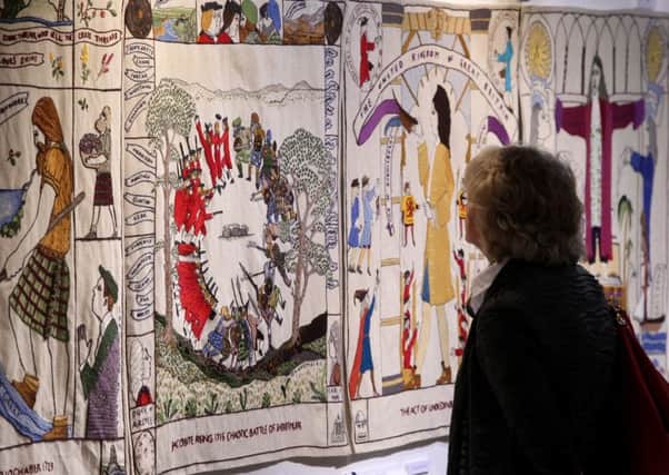 FILE PICTURE - The Great Tapestry of Scotland, measuring 143 meters which shows important moments in Scottish history from pre-history to modern times at the Scottish Parliament. See Centre Press story CPTAPESTRY; Fears have been raised that the mystery theft of a stitched panel depicting the suspected resting place of the HOLY GRAIL will never be solved. Police are still hunting a thief who nicked a stitched panel from the Great Tapestry of Scotland depicting the iconic Rosslyn Chapel in June. It is one of 160 individual panels which make up the artwork, stitched together by more than 1,000 volunteers from across country.