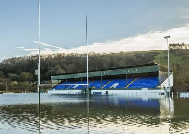 The flooded pitch of Hawick RFC after the River Teviot burst its banks after Storm Desmond tore through Britain in December
